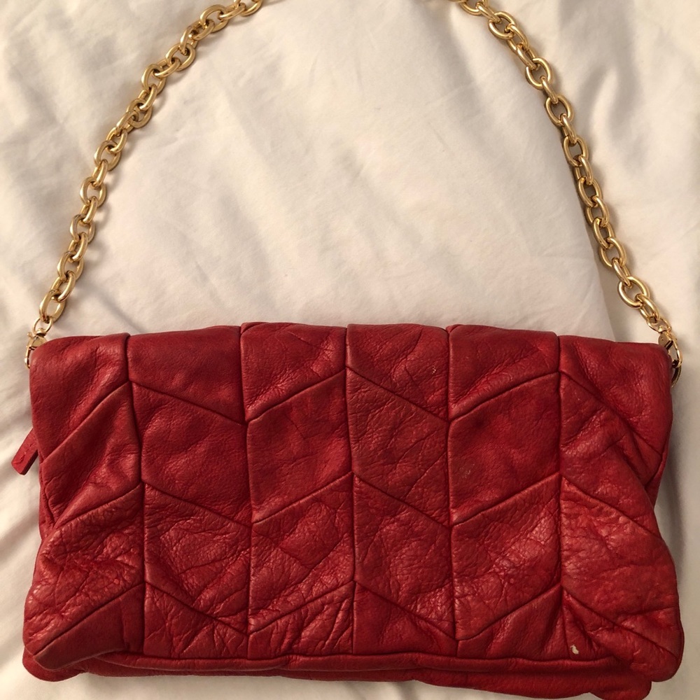 Genuine red leather clutch
